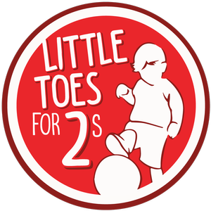 2 year old toddlers playing soccer with parents at HappyFeet